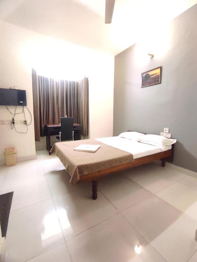 Apartamento Orkuz Residency Kochi Exterior foto