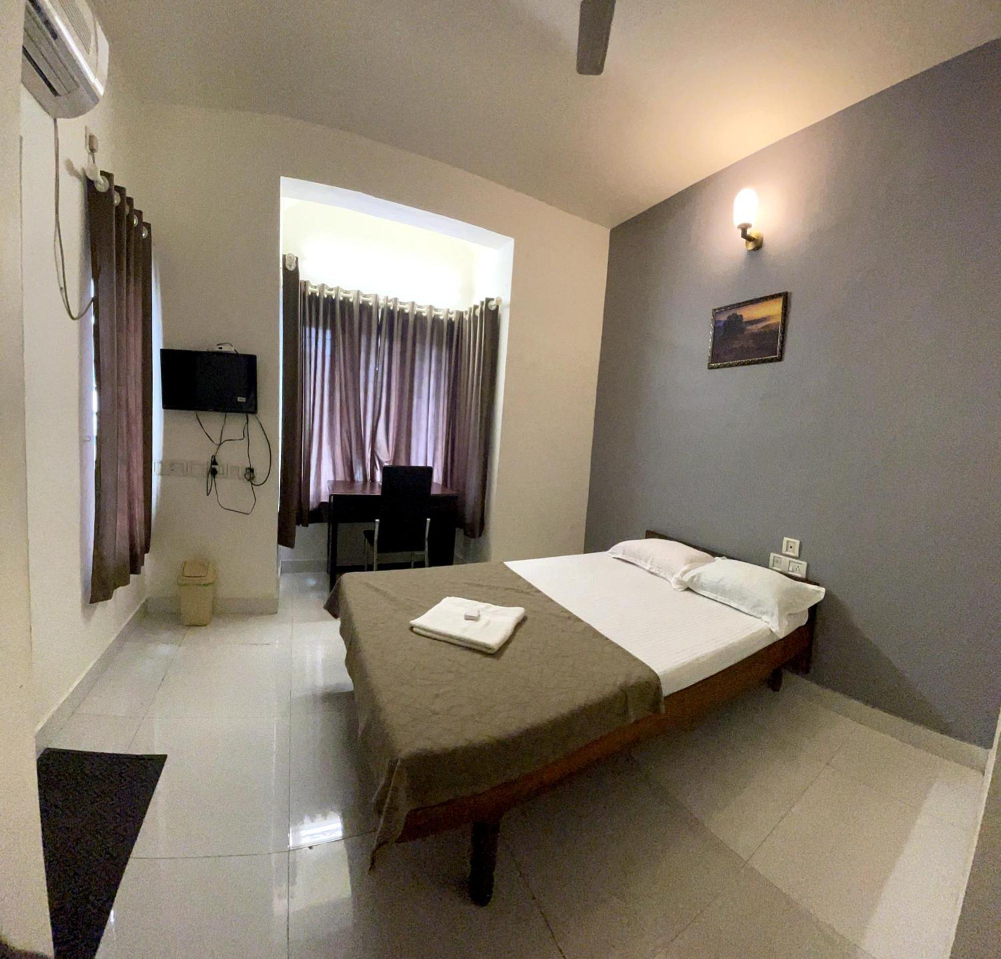 Apartamento Orkuz Residency Kochi Habitación foto