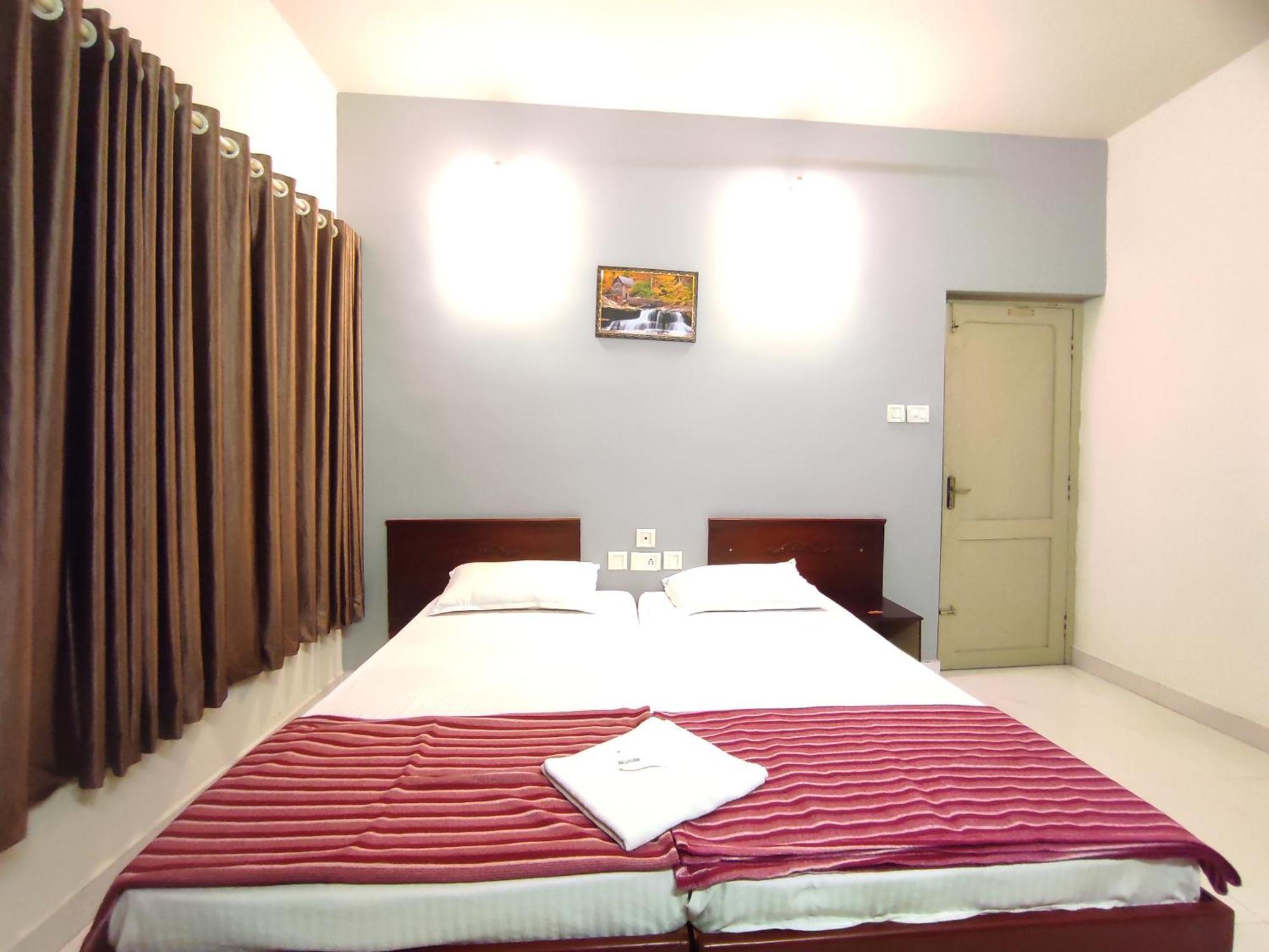 Apartamento Orkuz Residency Kochi Habitación foto